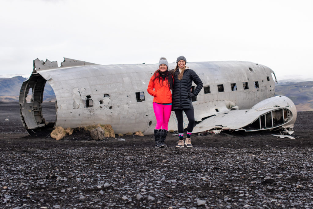 Two women in front of plane crash site in Iceland